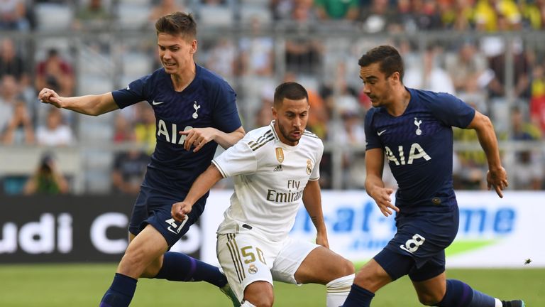 Spurs defender Juan Foyth (left) challenges Eden Hazard