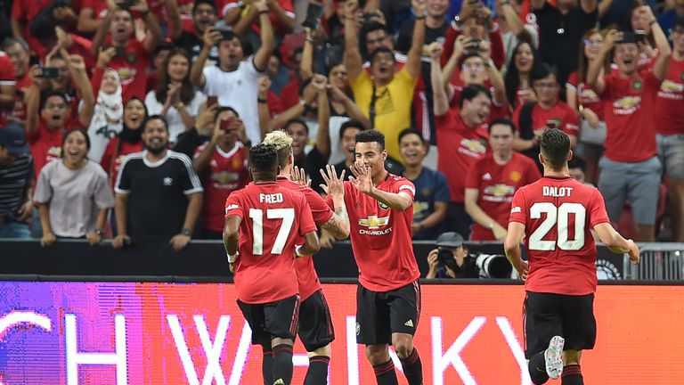 Greenwood (right) celebrates his winner against Inter