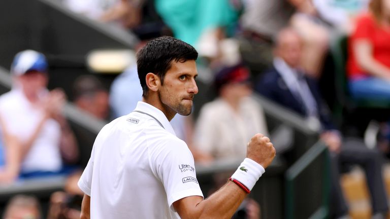 Djokovic celebrates winning the first set