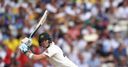Smith holds up England again
