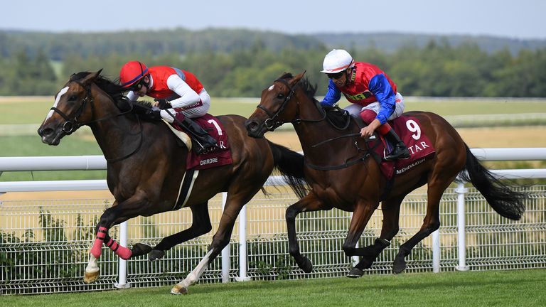 Oisin Murphy on Deirde (left) wins the Nassau Stakes