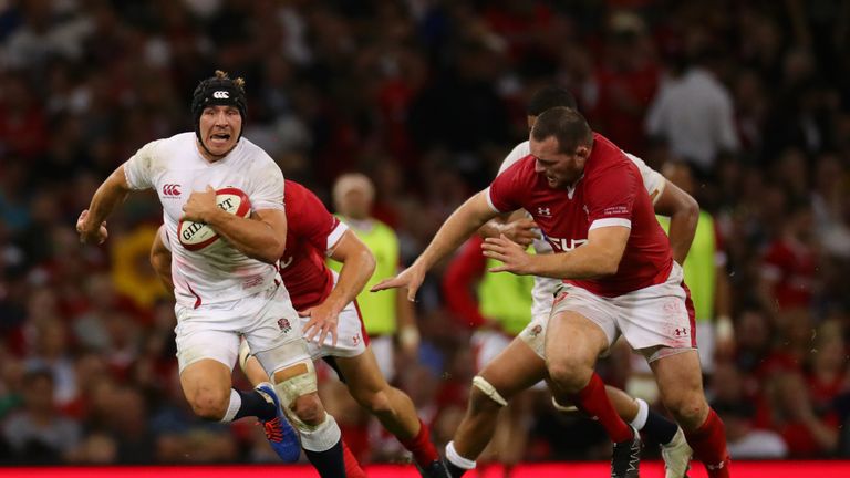 Piers Francis breaks past Jonathan Davies and Ken Owens in the warm-up match