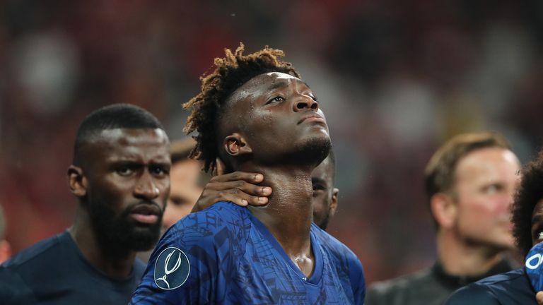Tammy Abraham is consoled by Chelsea team-mates after their shootout defeat in the Super Cup