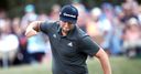 Rahm happy to tough it out