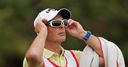Mike Dean caddies for hole-in-one!
