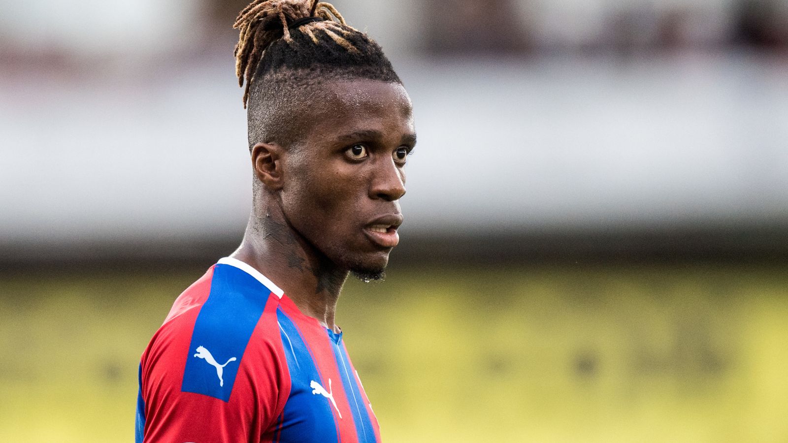 Crystal Palace say they have taken action over racist abuse of Wilfried Zaha on social media