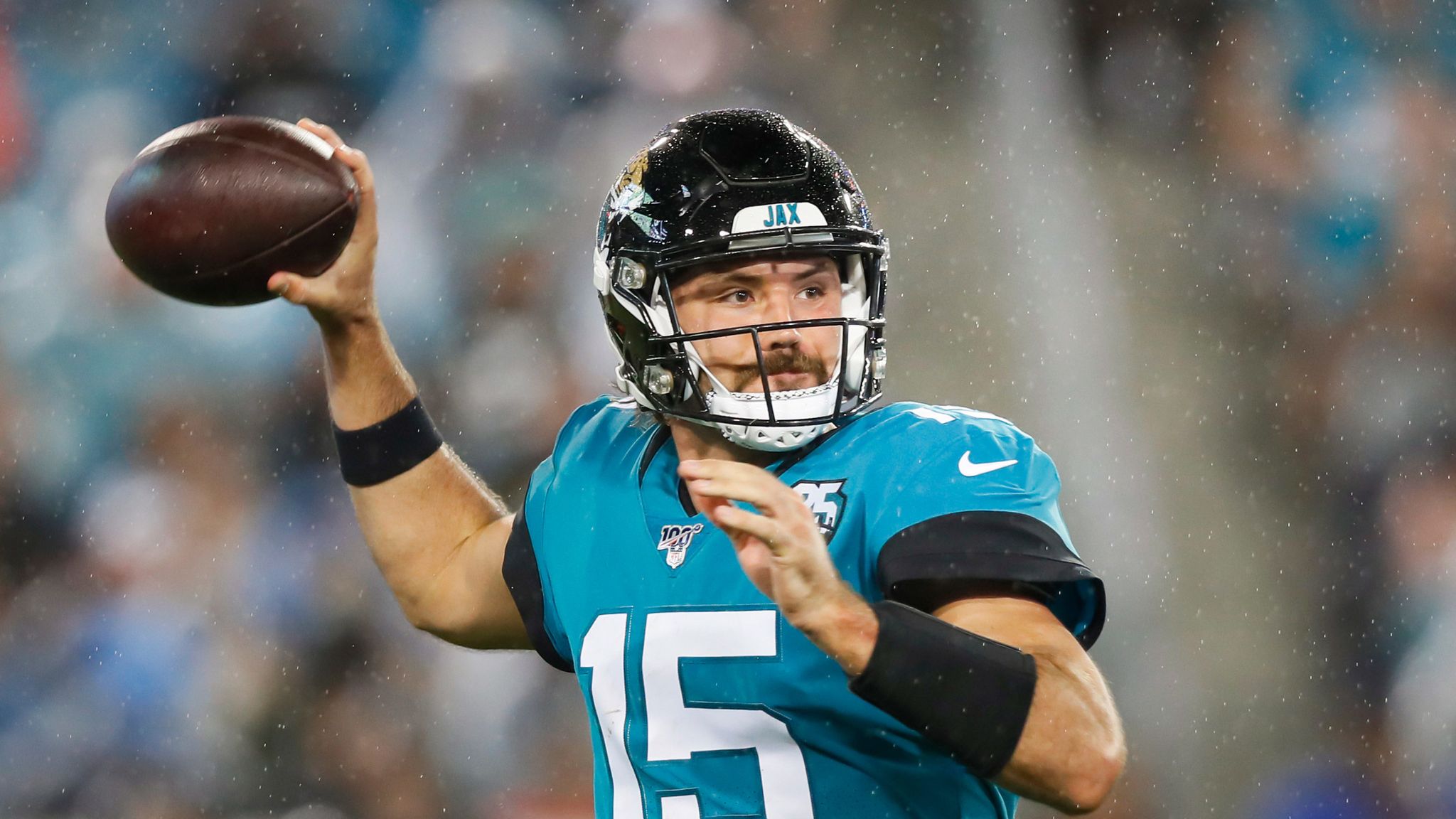 Jacksonville Jaguars quarterback Gardner Minshew (15) runs against the Carolina  Panthers during …