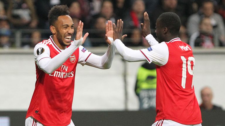 Pierre-Emerick Aubameyang celebrates his goal with Nicolas Pepe