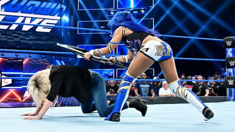 A night after brutalising Raw women’s champion Becky Lynch, SmackDown women’s champion Bayley and Sasha Banks turned their sights to Charlotte Flair