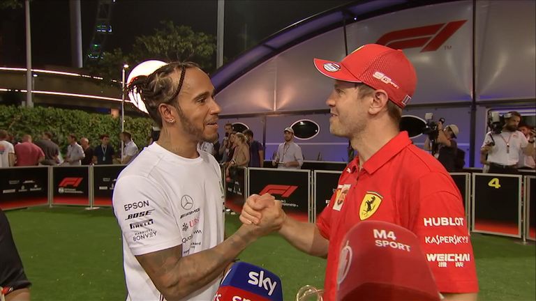 Ferrari's Sebastian Vettel's post-race interview was interrupted by rival Lewis Hamilton who was keen to offer his congratulations.