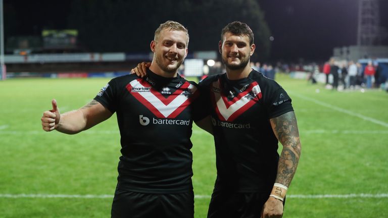 Broncos try-scorer Jay Pitts (right) and Jordan Abdull celebrate