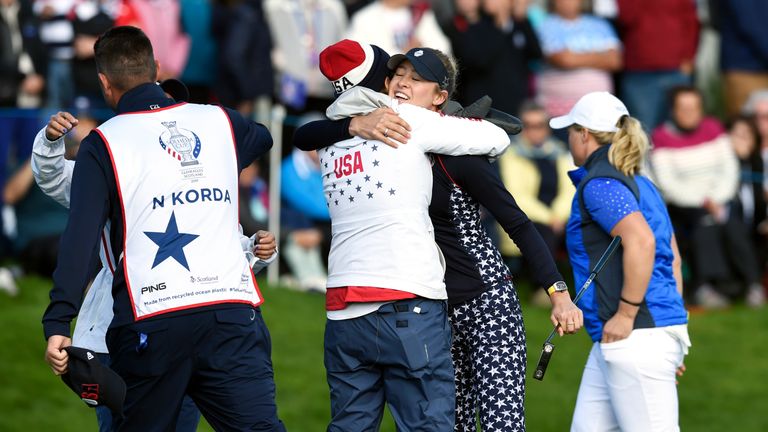 Nelly Korda celebrates with Team USA captain Juli Inkster after winning her singles match