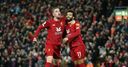 Liverpool power through after Spurs scare