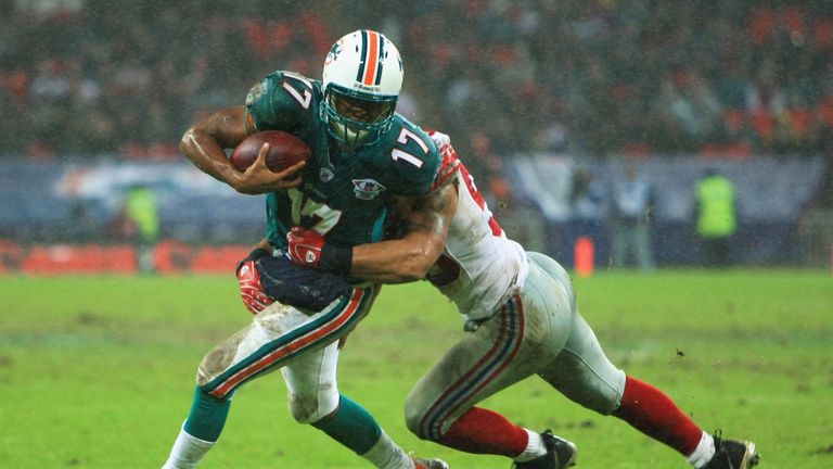 Dolphins quarterback Cleo Lemon had a dreadful day in the rain