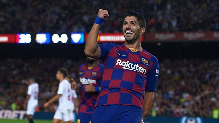 Luiz Suarez opened the scoring for Barcelona on Sunday