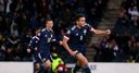 McGinn inspires Scotland comeback