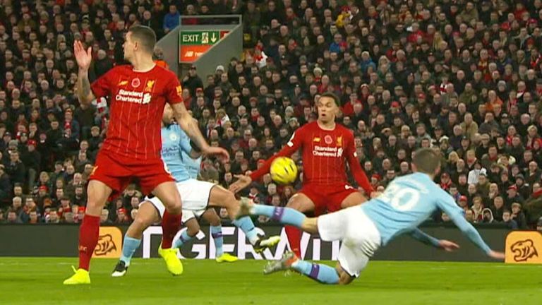 Trent Alexander-Arnold appears to handle the ball against Manchester City