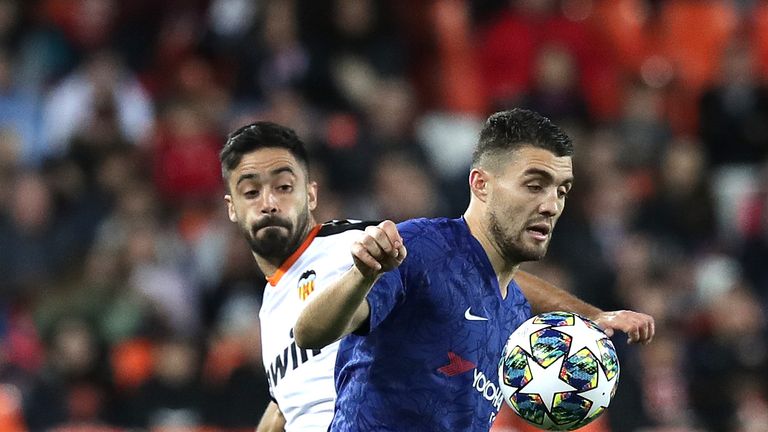 Valencia's Jaume Costa battles for possession with Chelsea's Mateo Kovacic