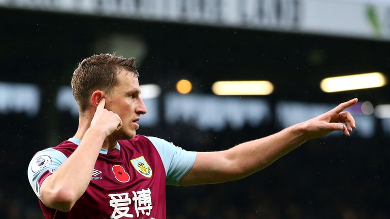 Chris Wood celebrated with a mock-VAR check