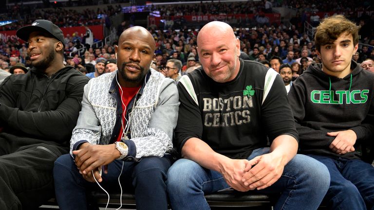 Floyd Mayweather poses with UFC chief Dana White