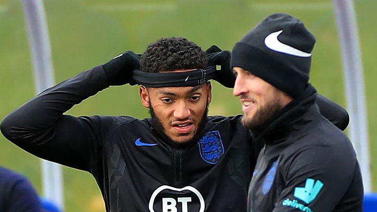 Gomez pictured during England training with a large scratch underneath his right eye