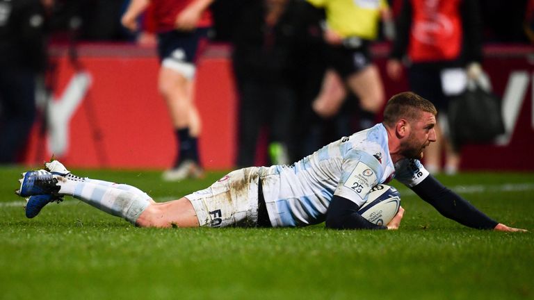 Finn Russell slides over for the opening try of the night in Limerick