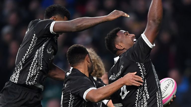 Fiji celebrate their win against the Baa-Baas at Twickenham