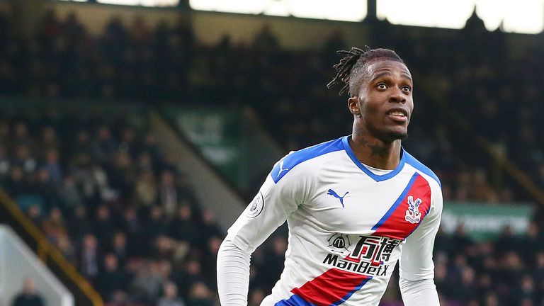 Wilfried Zaha celebrates after putting Crystal Palace ahead at Burnley