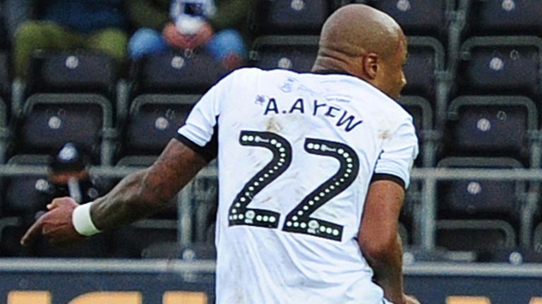 Andre Ayew of Swansea City scores the opening goal