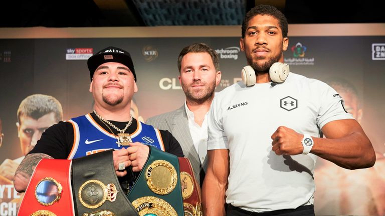Ruiz Jr posed with the world titles which Joshua previously held