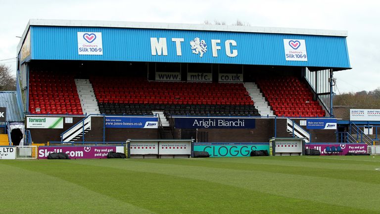 Macclesfield Town's owners have been given time to settle the club's debts