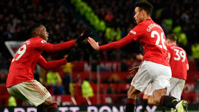 Mason Greenwood celebrates scoring United's equaliser against Everton
