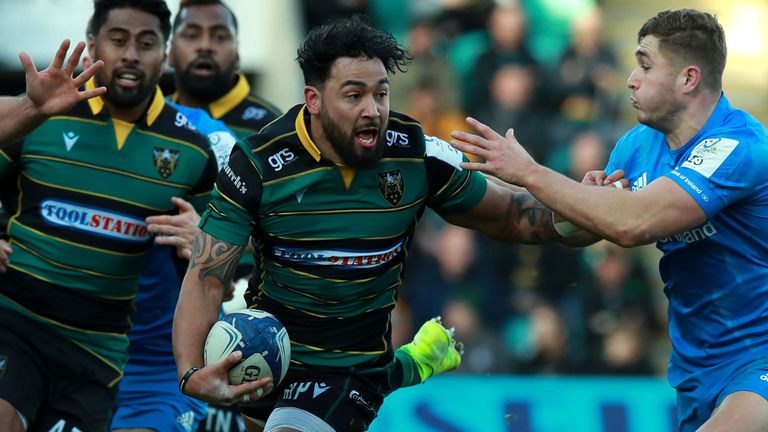 Saints centre Matt Proctor is tackled by Jordan Larmour