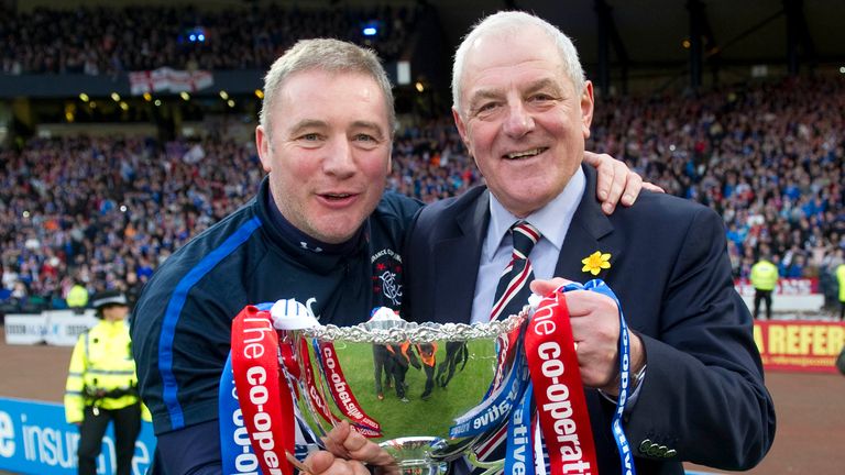 Smith and assistant Ally McCoist celebrate Rangers' League Cup final win in 2011