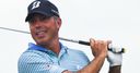 Kuchar jumps top in Singapore