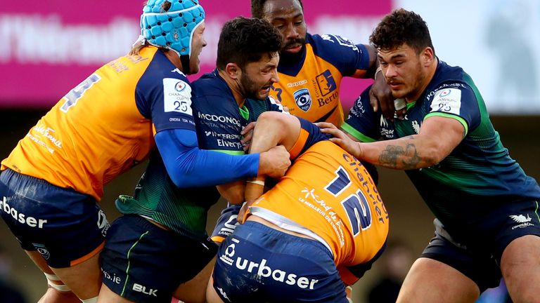 Connacht's Colby Fainga is tackled by Nico Janse van Rensburg, Fulgence Ouedraogo and Jan Serfontein