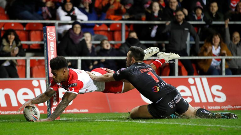 St Helens' Kevin Naiqama goes over for his second try against Salford 