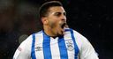 Huddersfield win to ease relegation fears