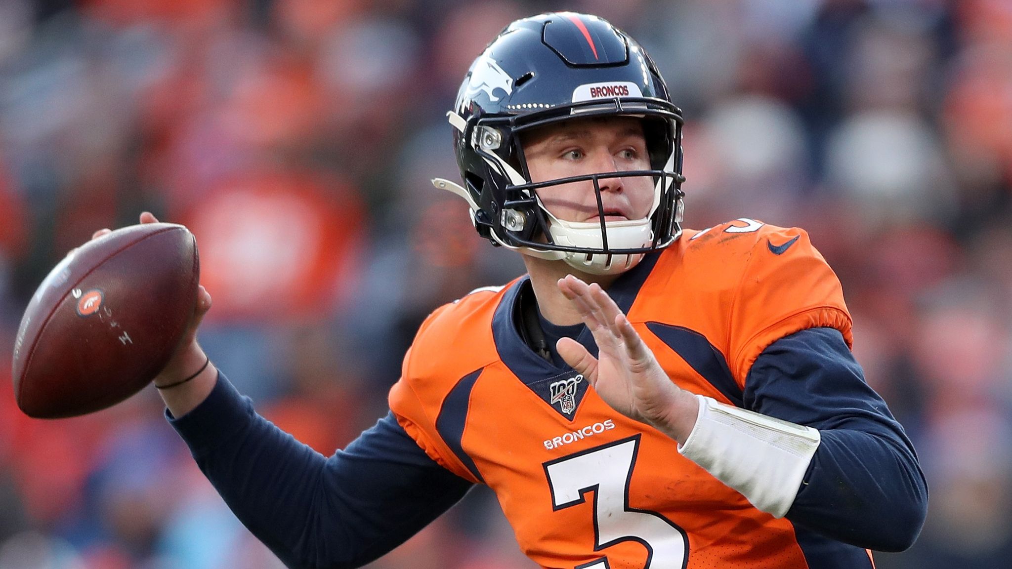 Denver Broncos quarterback Joe Flacco passes during warmups before