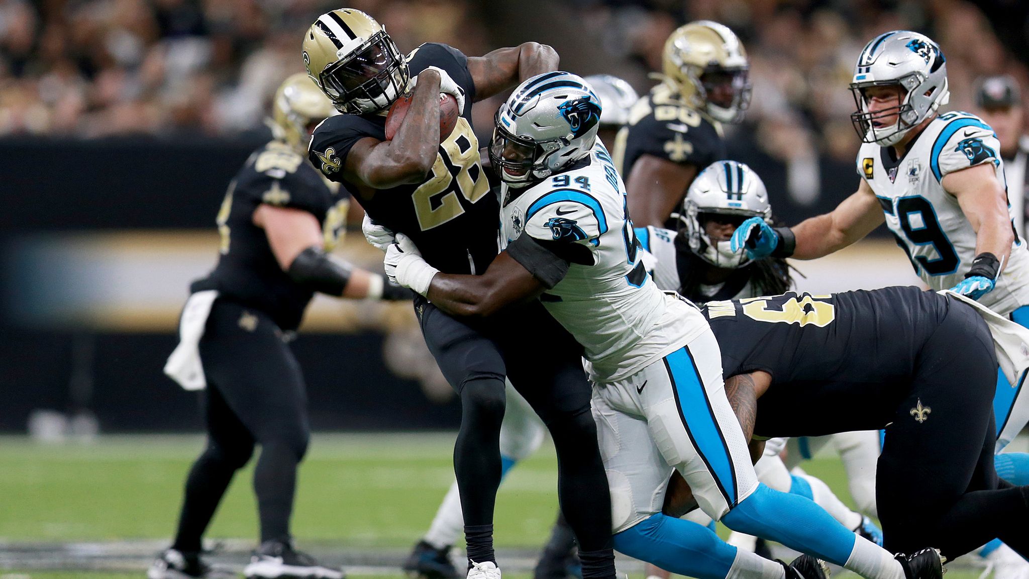 Efe Obada gets game ball from Carolina Panthers head coach Ron Rivera after  NFL debut