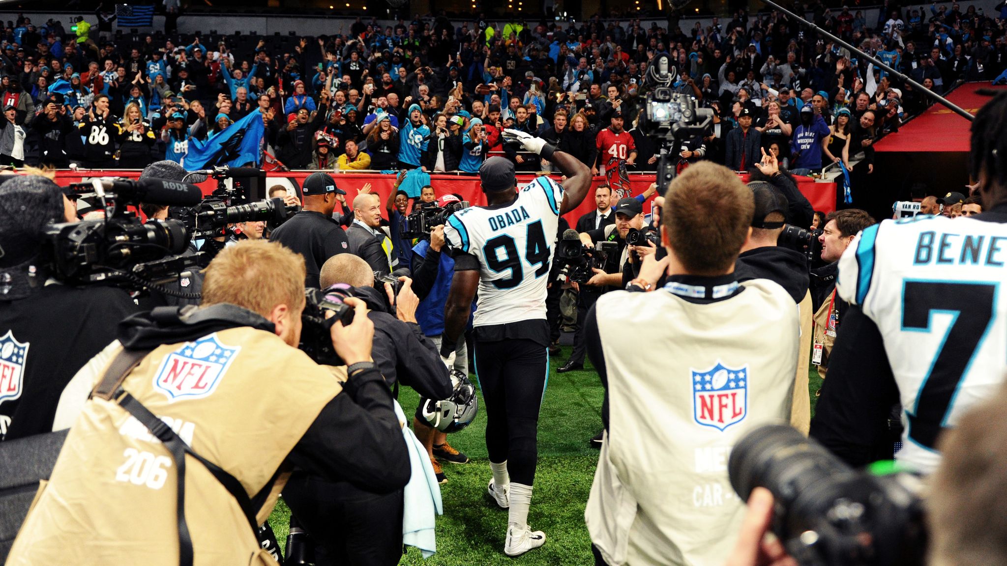 Carolina Panthers defensive end Efe Obada (94) is interviewed on the  sidelines after playing against the Tampa Bay Buccaneers in an NFL football  game, Sunday, Oct. 13, 2019, at Tottenham Hotspur Stadium