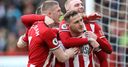 Sharp helps Sheff Utd close in on CL places