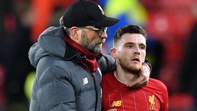 Jurgen Klopp pictured with Andrew Robertson at Stamford Bridge