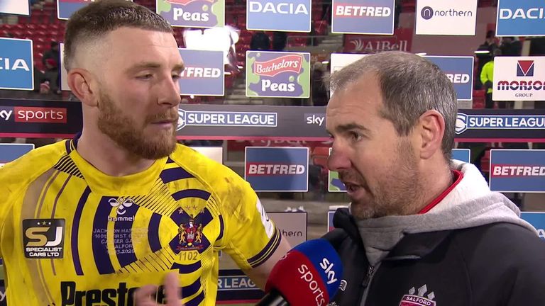 Wigan's Jackson Hastings chats to Jenna Brooks alongside former head coach Ian Watson, after Salford's victory over the Warriors.