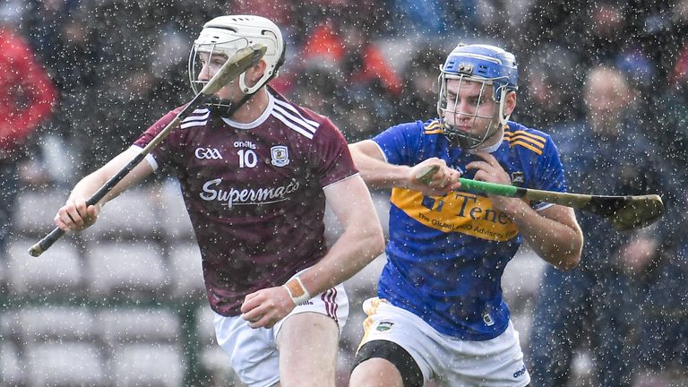 Cathal Mannion of Galway in action against John McGrath of Tipperary