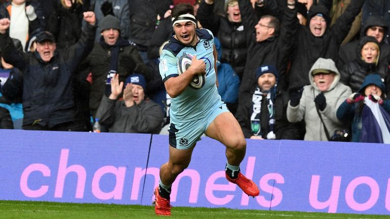 Stuart McInally races away to score Scotland's third try