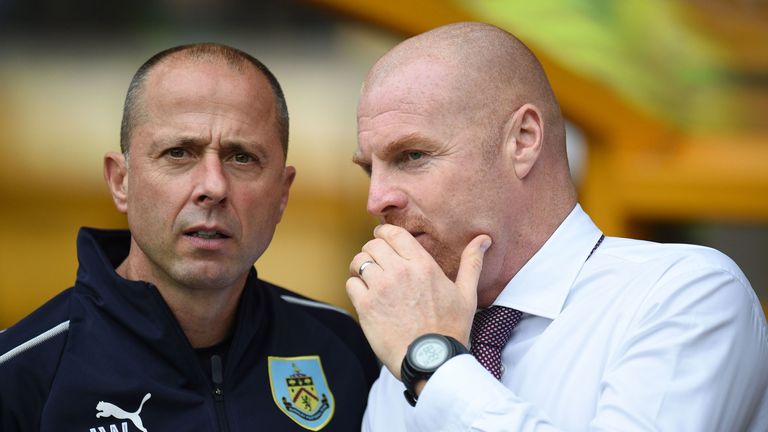 Burnley manager Sean Dyche's assistant Ian Woan (left) has tested positive for the coronavirus
