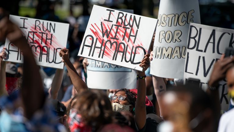Demonstrators protest the shooting death of Ahmaud Arbery at the Glynn County Courthouse in Brunswick, Georgia