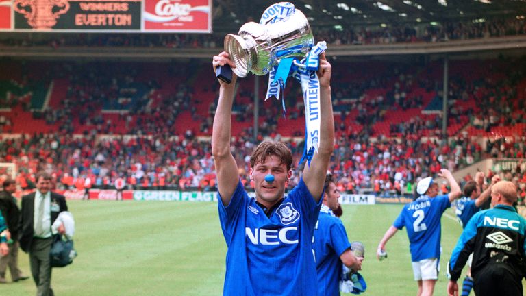 Substitute Duncan Ferguson celebrates with the FA Cup at Wembley