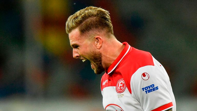 Andre Hoffman celebrates Dusseldorf's win at full-time